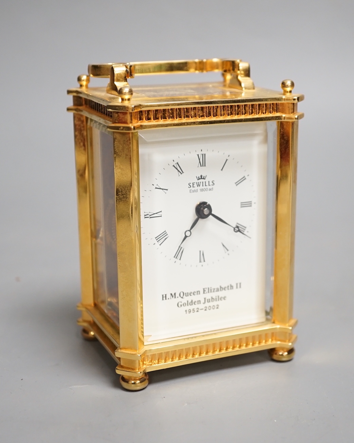 A Golden Jubilee commemorative carriage timepiece, retailed by Sewills - 12cm high